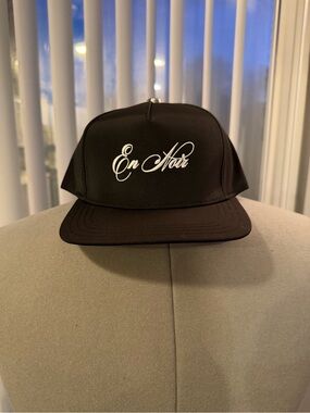 nOir Jewelry Black Cap with White Script Logo